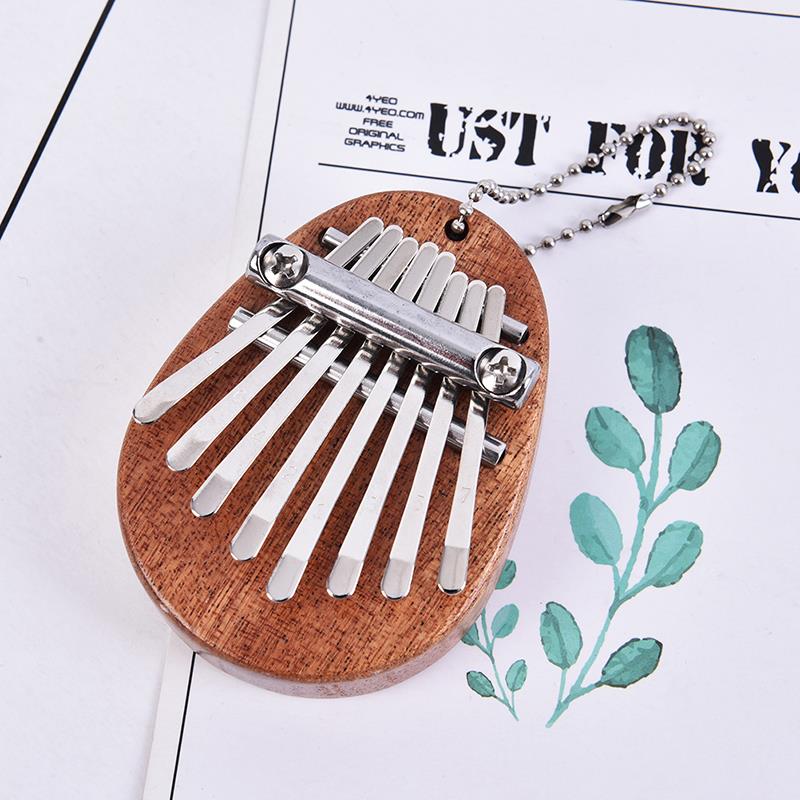 8 مفاتيح Kalimba الإبهام البيا - مراجعة Musical Instrument In Africa وسعره