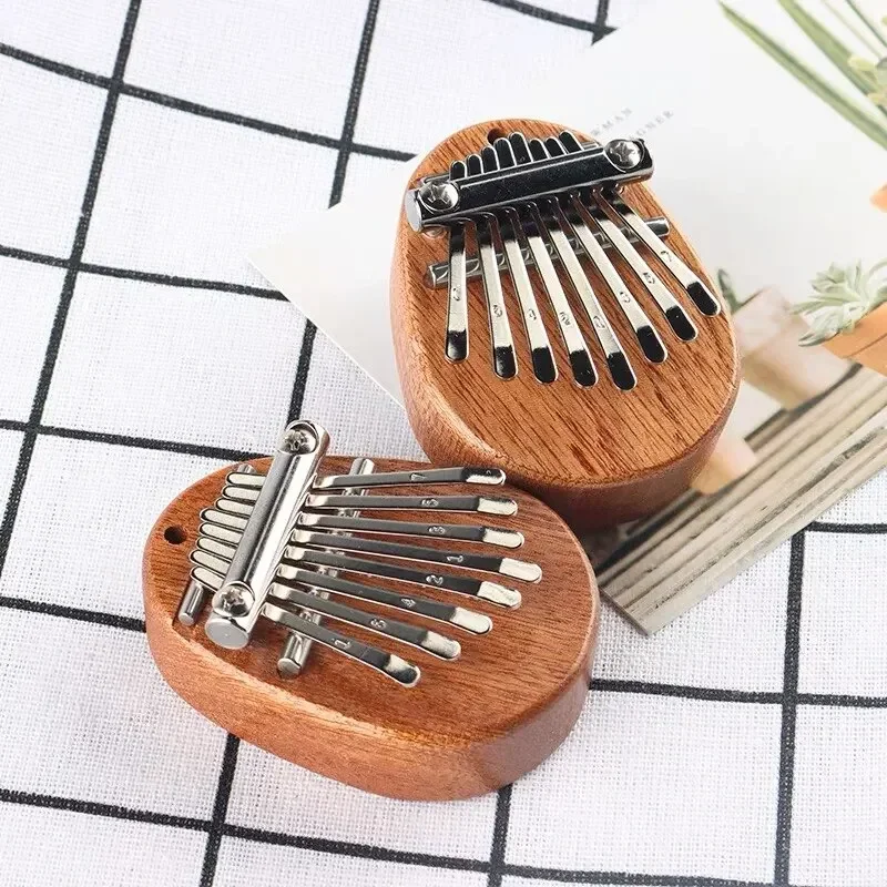 بيانو إصبع خشبي صغير بـ 8 نغما - مراجعة Musical Instrument For Beginners وسعره